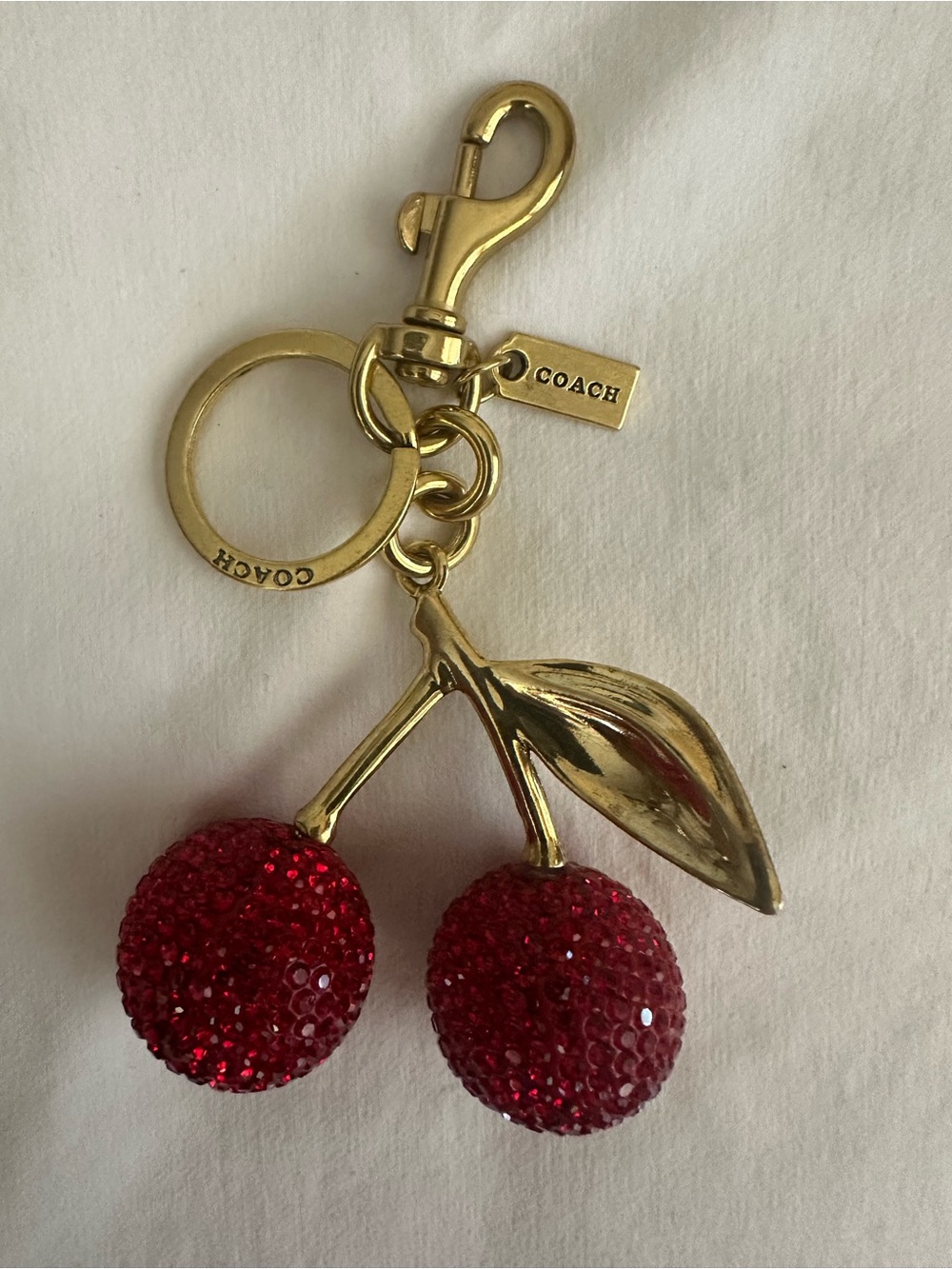 COACH Gold-Tone Cherry Crystal Keyring - Red